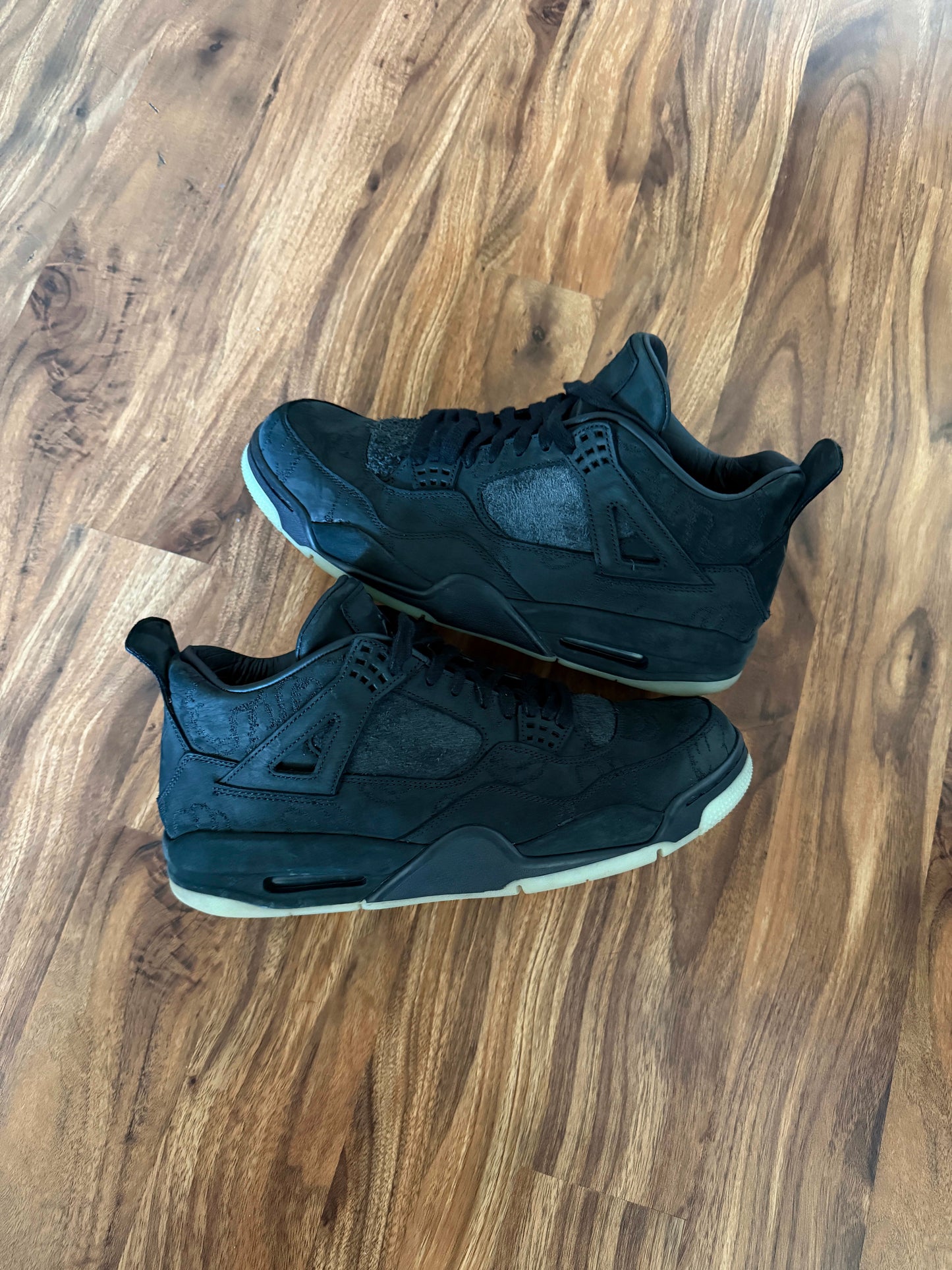 Size 11.5 Preowned (NB) Jordan 4 Retro Kaws Black